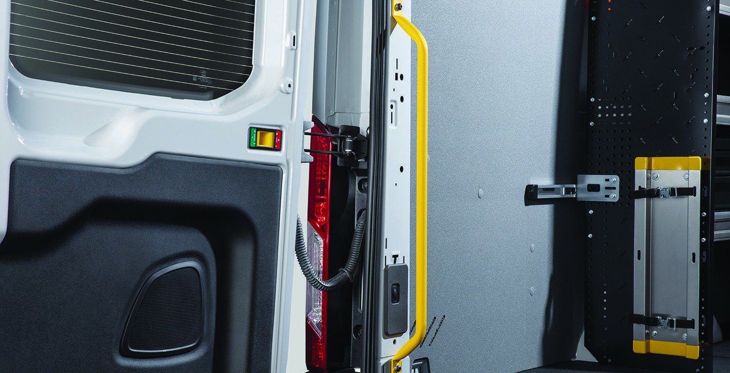 2026 Ford Transit factory-order upfit brochure reference — D-Pillar Grab Handle Kit
