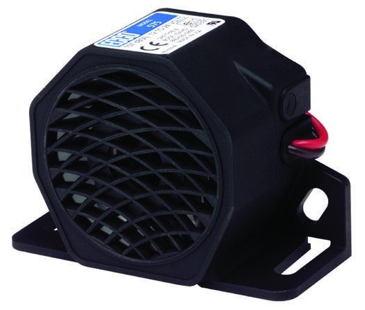 Ford brochure back-up alarm reference; confirm the unit for the selected tonal or white-noise option
